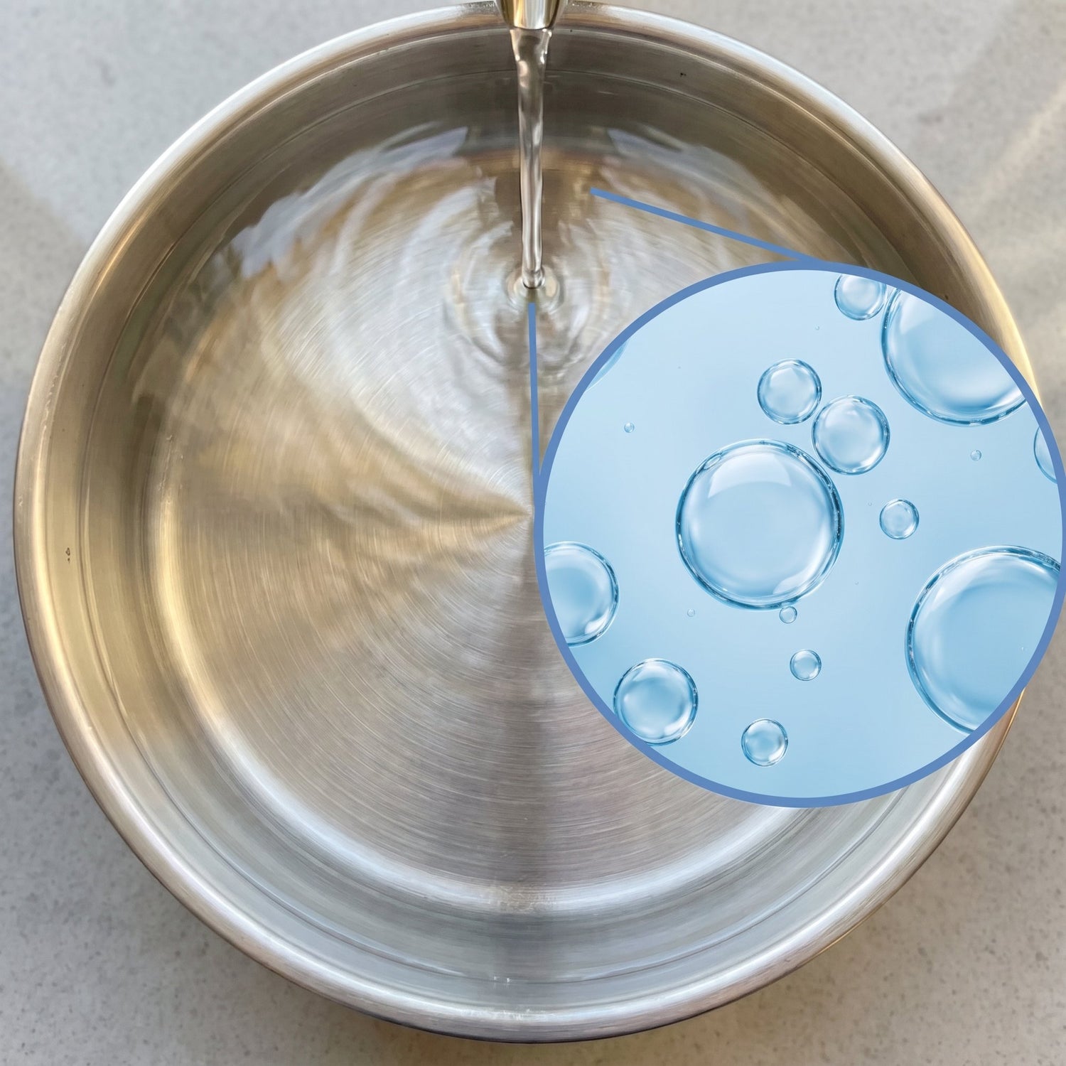 Clean filtered water in a stainless steel dog fountain